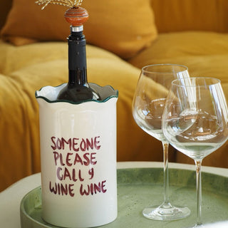 'Someone please call 9 wine wine' Wine cooler